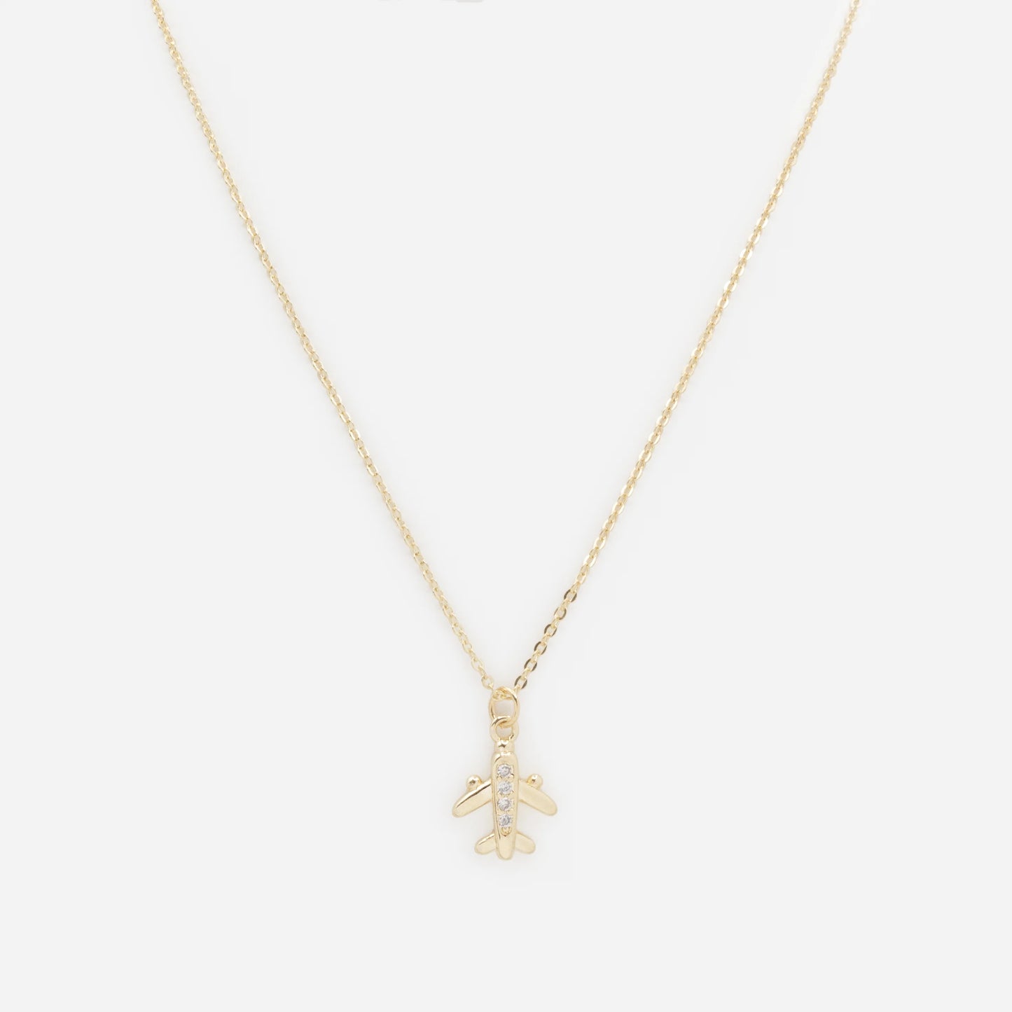 Small plane charm golden necklace with cubic zirconia