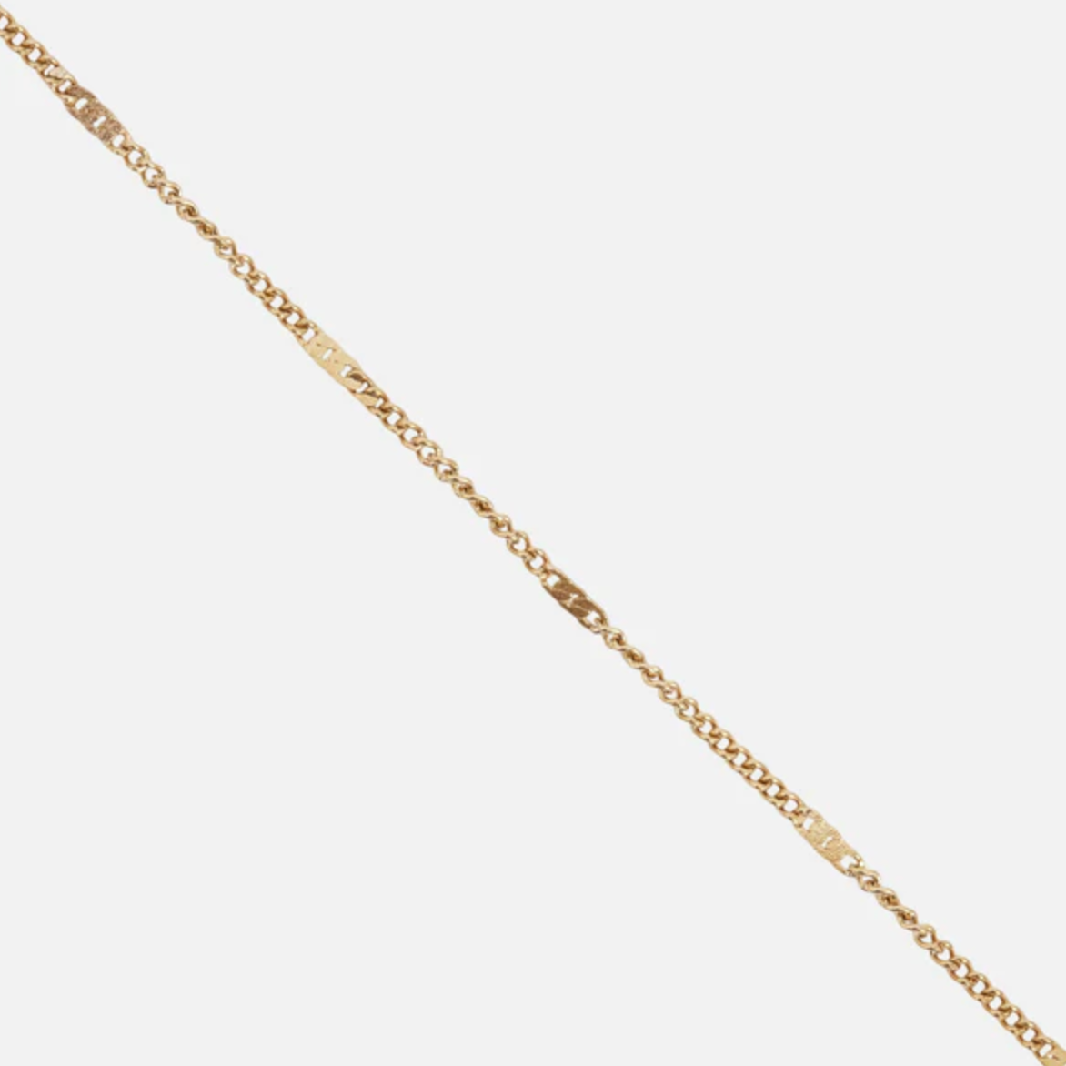 Gold bracelet with flat stainless steel inserts