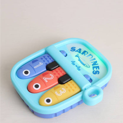 Bitzy Tunes™ Light-up Interactive Piano Toy - Sardines