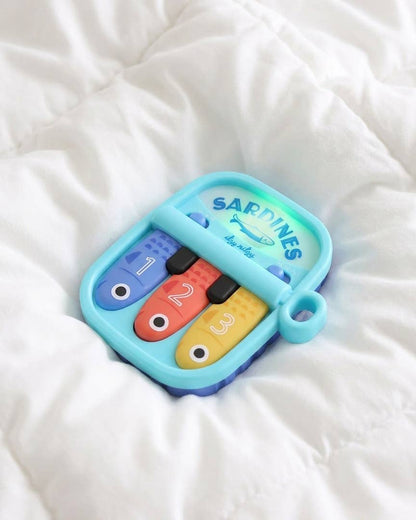 Bitzy Tunes™ Light-up Interactive Piano Toy - Sardines