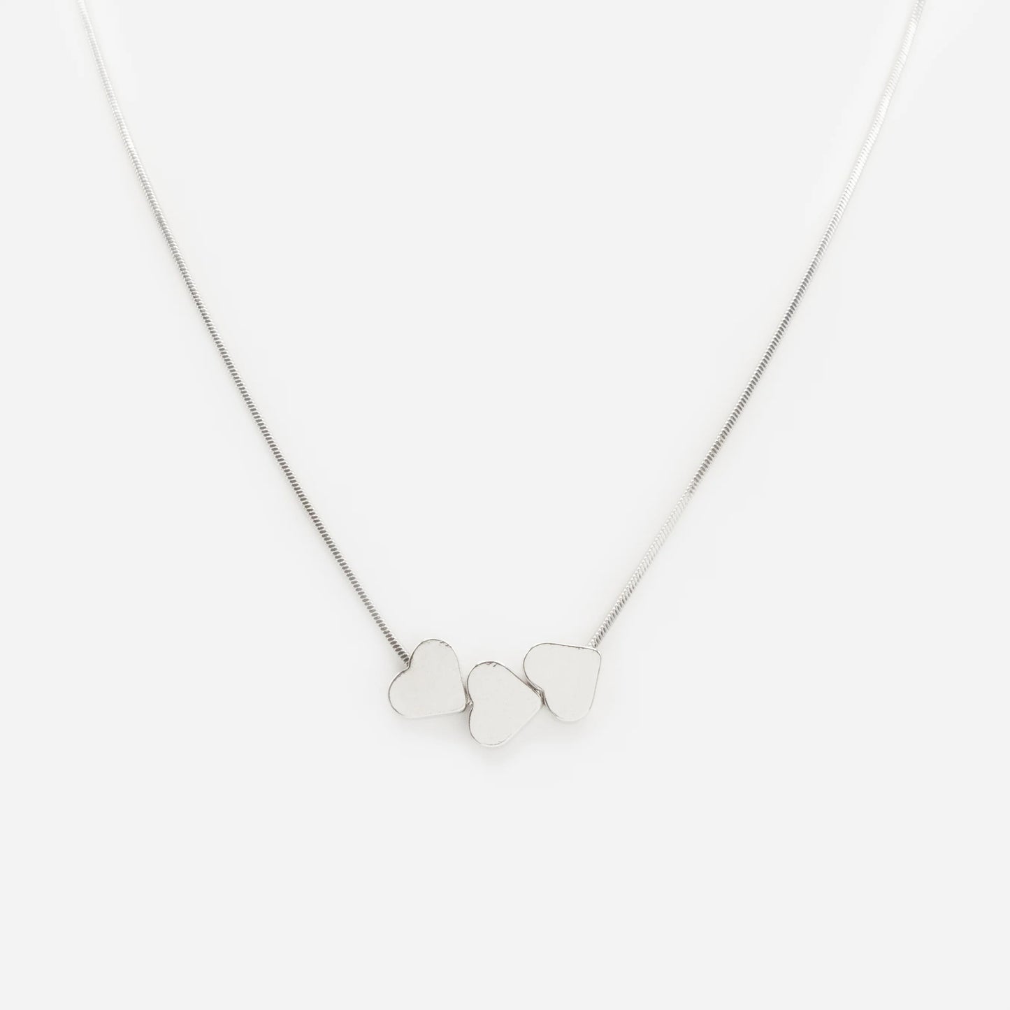 Silvered necklace with flat heart trio