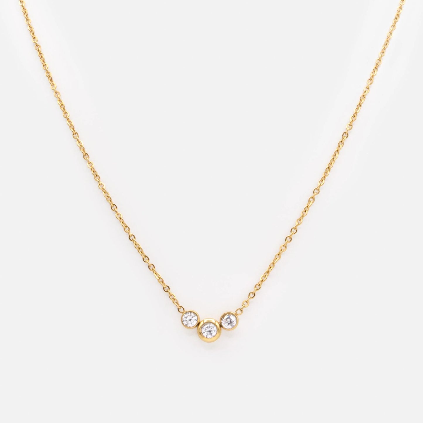 Golden necklace in stainless steel with cubic zirconia trio