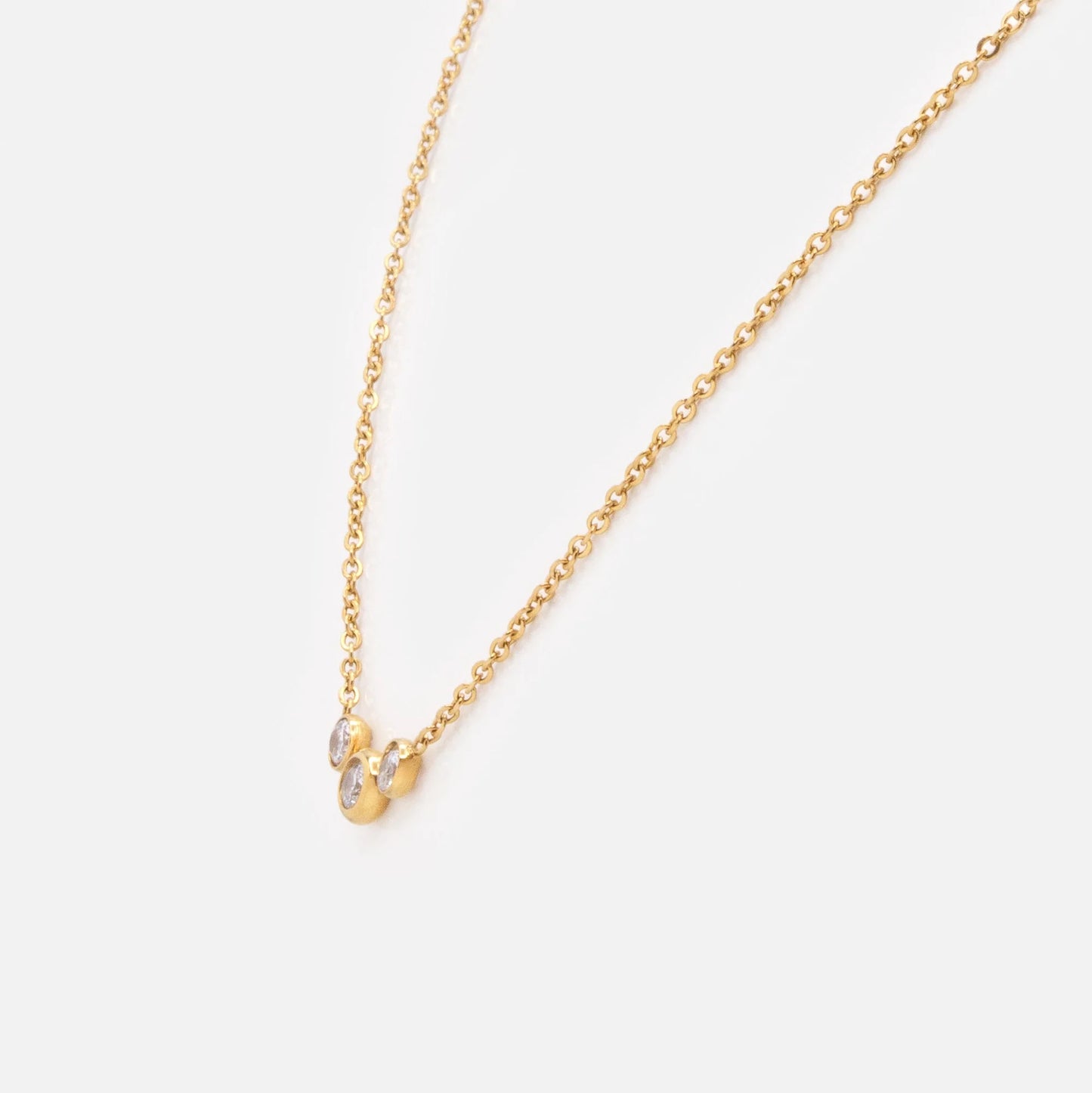 Golden necklace in stainless steel with cubic zirconia trio
