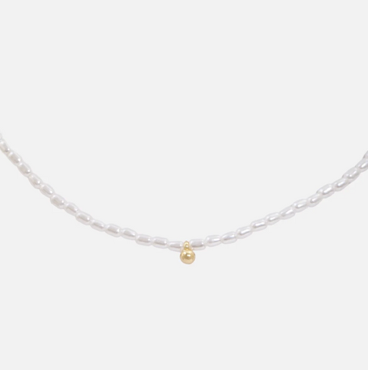 Synthentic pearl necklace with gold charm