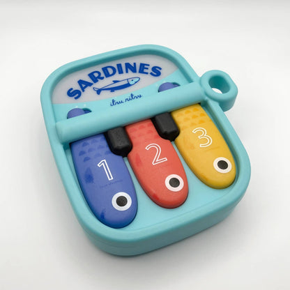 Bitzy Tunes™ Light-up Interactive Piano Toy - Sardines