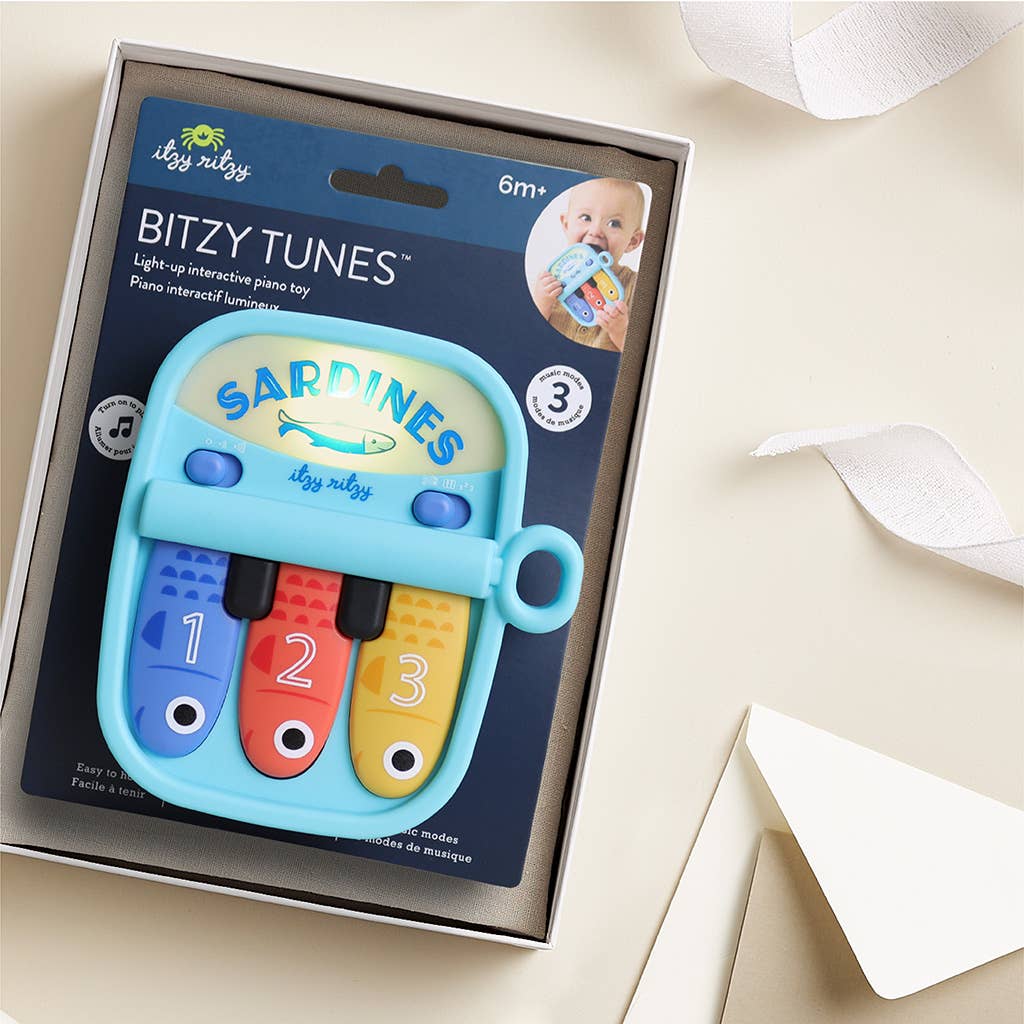 Bitzy Tunes™ Light-up Interactive Piano Toy - Sardines